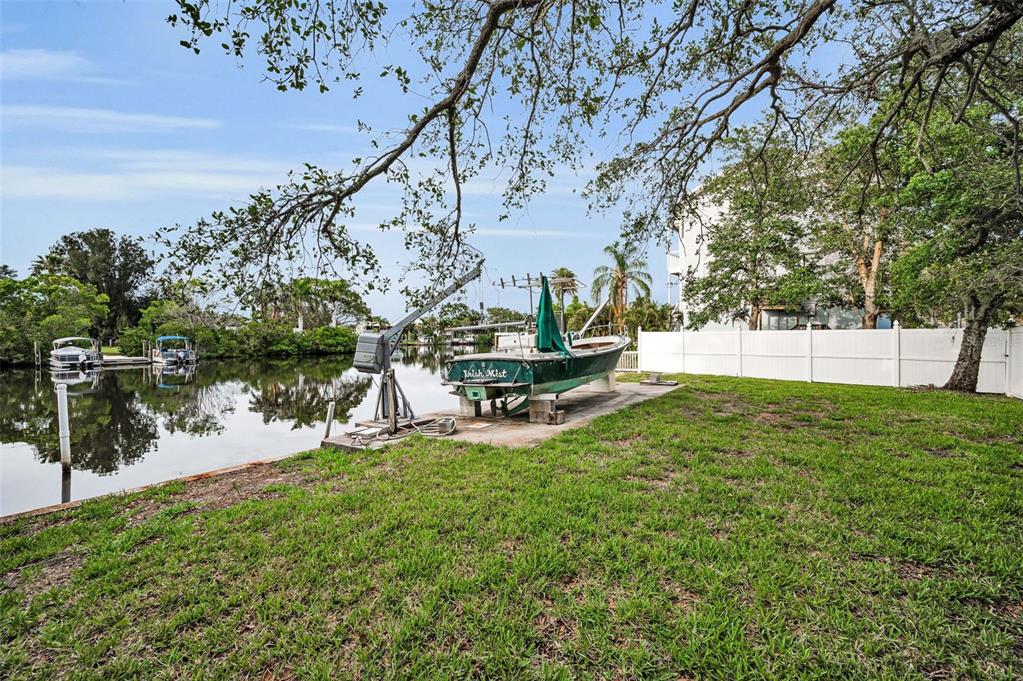 394 Georgia Avenue Crystal Beach, FL 34683 - Photo 26 of 69 a view of yard with swimming pool and seating area