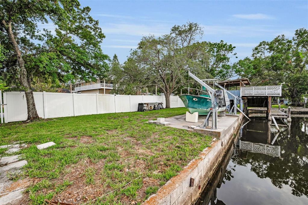 394 Georgia Avenue Crystal Beach, FL 34683 - Photo 31 of 69 a view of a house with backyard