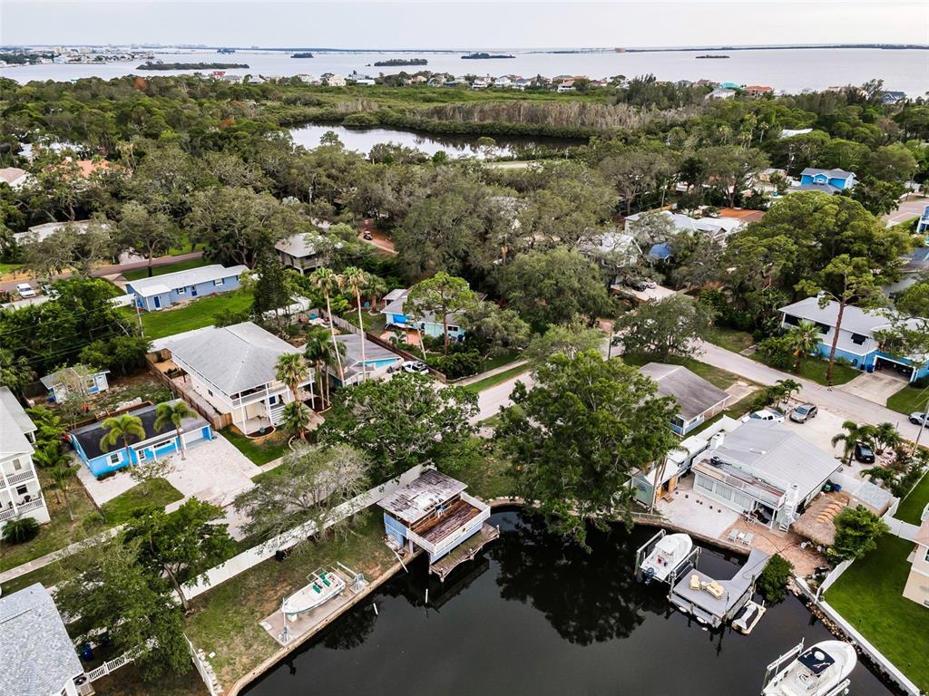 394 Georgia Avenue Crystal Beach, FL 34683 - Photo 40 of 69 an aerial view of a city with lots of residential buildings