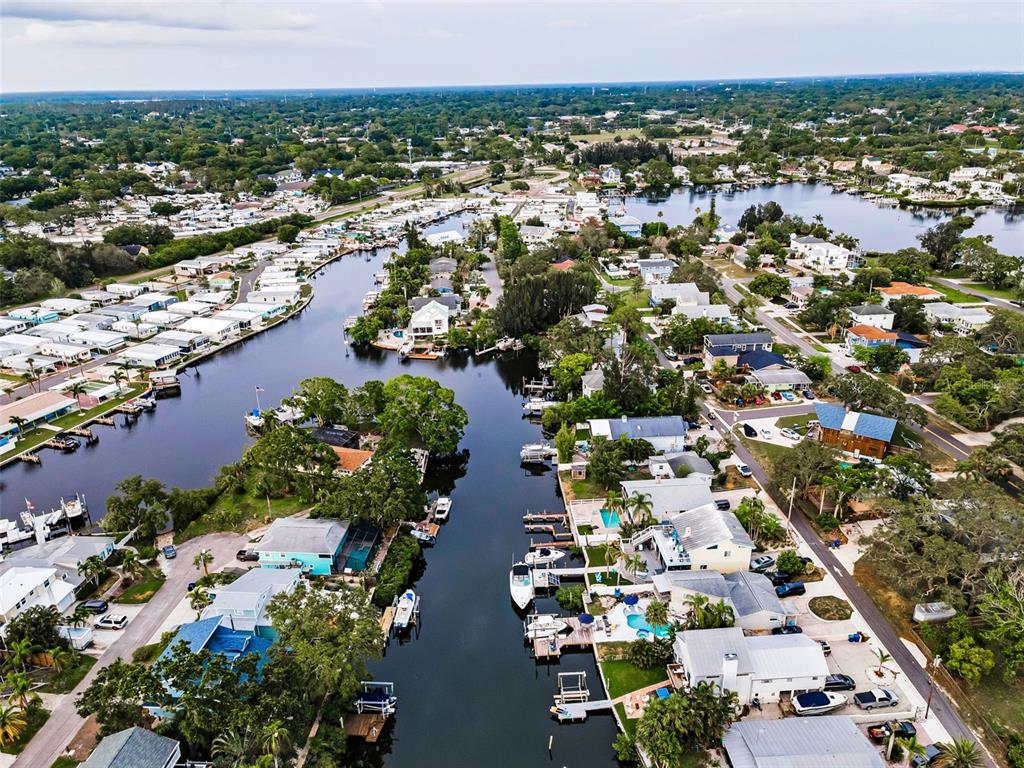 394 Georgia Avenue Crystal Beach, FL 34683 - Photo 44 of 69 an aerial view of residential houses with outdoor space