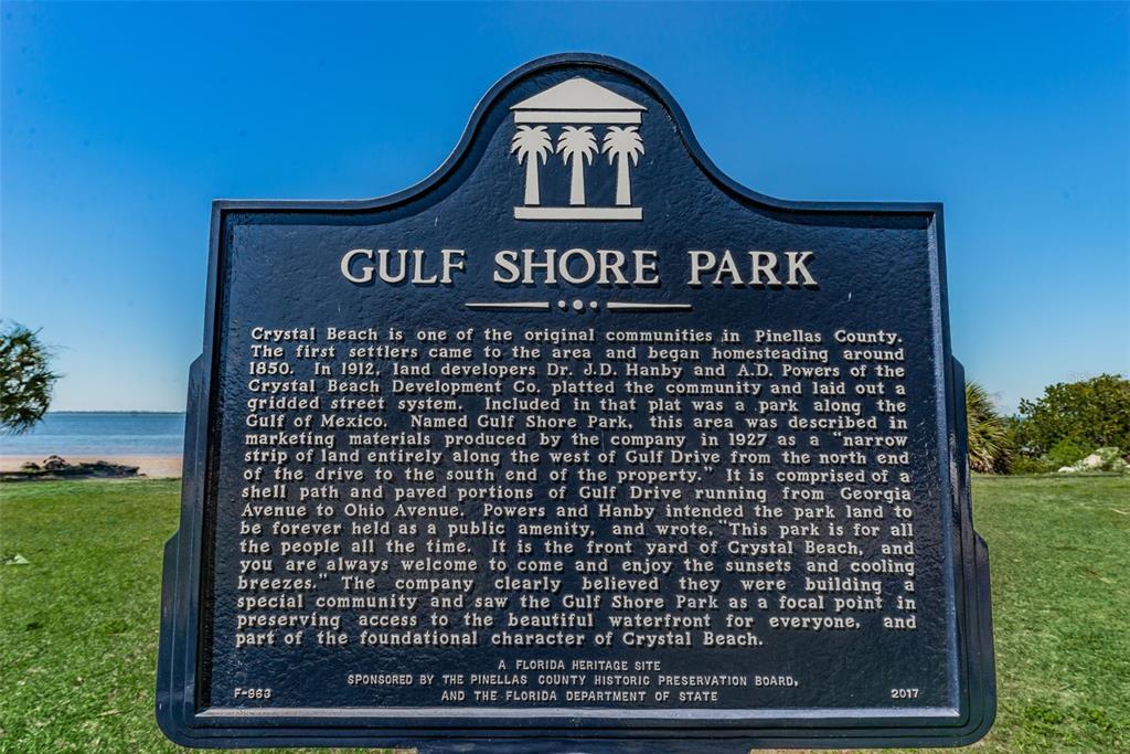 394 Georgia Avenue Crystal Beach, FL 34683 - Photo 54 of 69 a sign on the side of a building