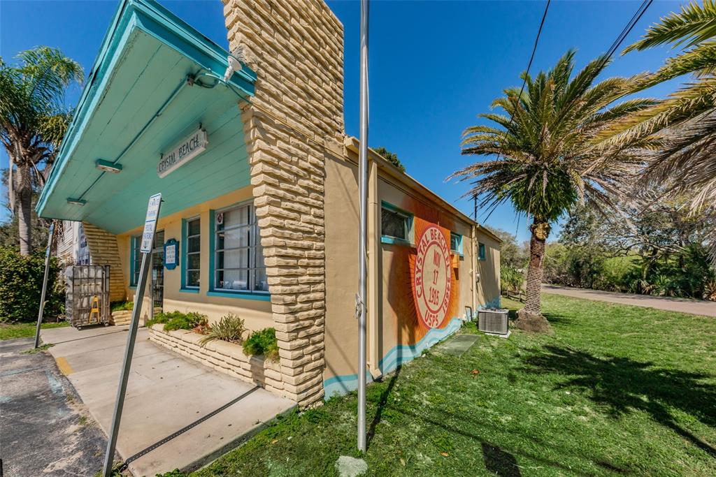 394 Georgia Avenue Crystal Beach, FL 34683 - Photo 67 of 69 a view of a house with backyard and trees