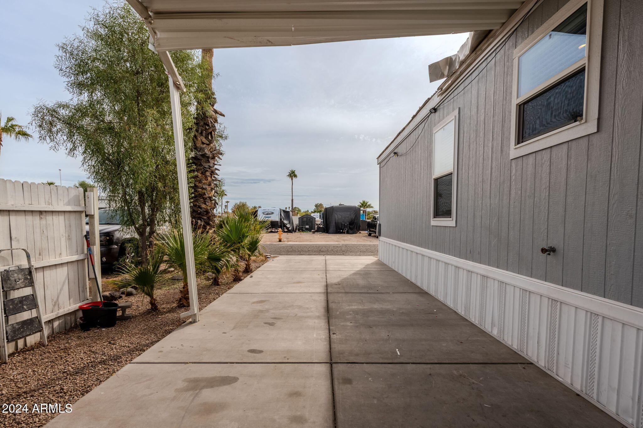 625 West McKellips Road, Unit 213 Mesa, AZ 85201 - Photo 35 of 45 Cement slab for parking