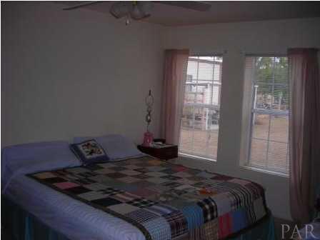 9491 American Farms Road Milton, FL 32583 - Photo 6 of 10 Master Bedroom