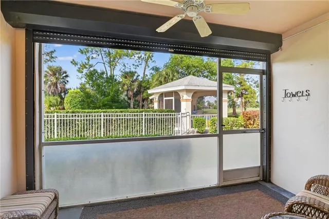 a view of a room with a large window
