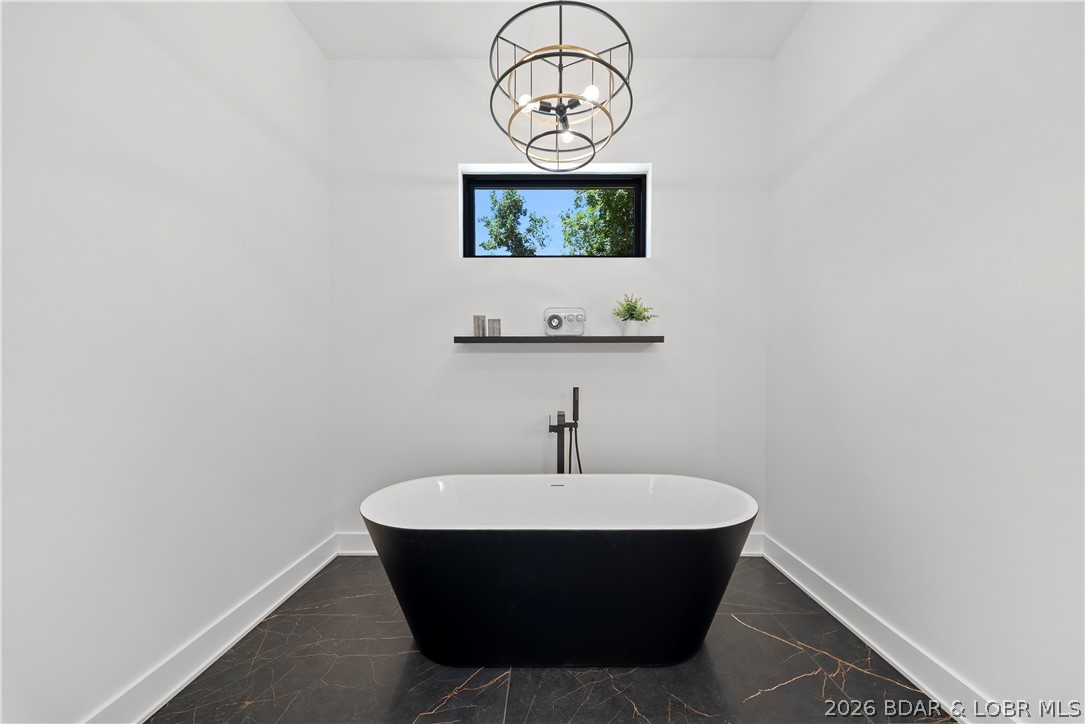 222 Red Bud Road Lake Ozark, MO 65049 - Photo 30 of 64 Freestanding soaking tub creates the perfect spa-l