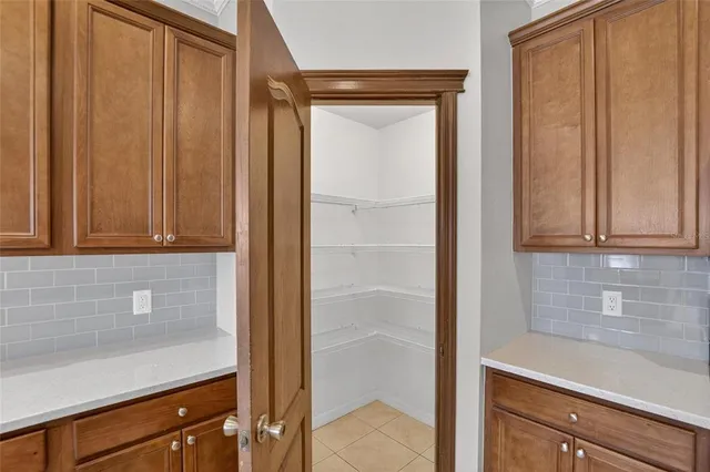 a bathroom with a tub sink toilet and mirror