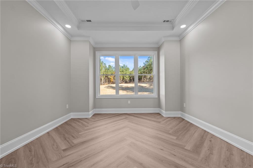 1168 Riverside Drive Lexington, NC 27292 - Photo 18 of 50 Detailed Flooring in Primary Bedroom