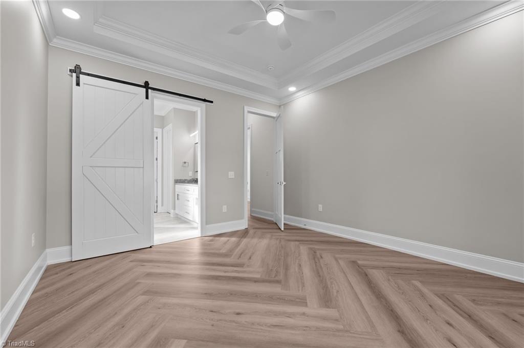 1168 Riverside Drive Lexington, NC 27292 - Photo 19 of 50 Barn Door in Primary Suite