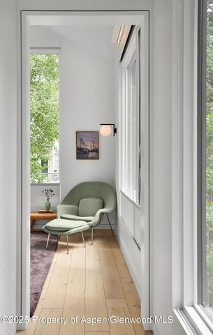 a living room with a couch and a window