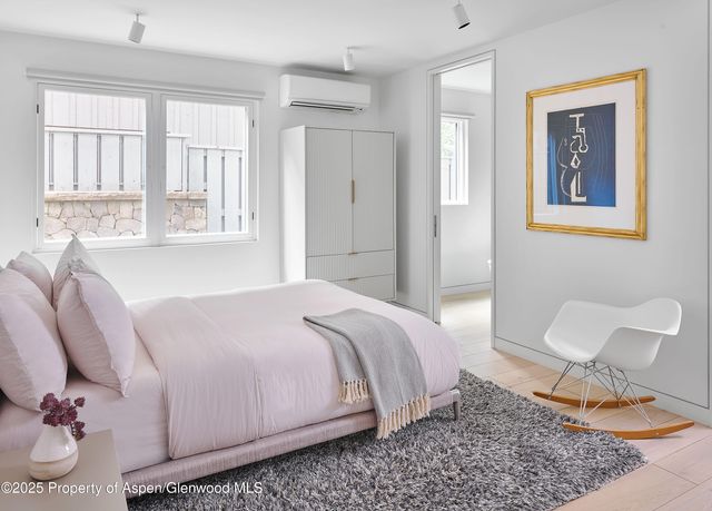 a bathroom with a sink vanity and a mirror
