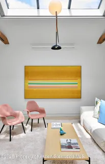a living room with a couch and a table