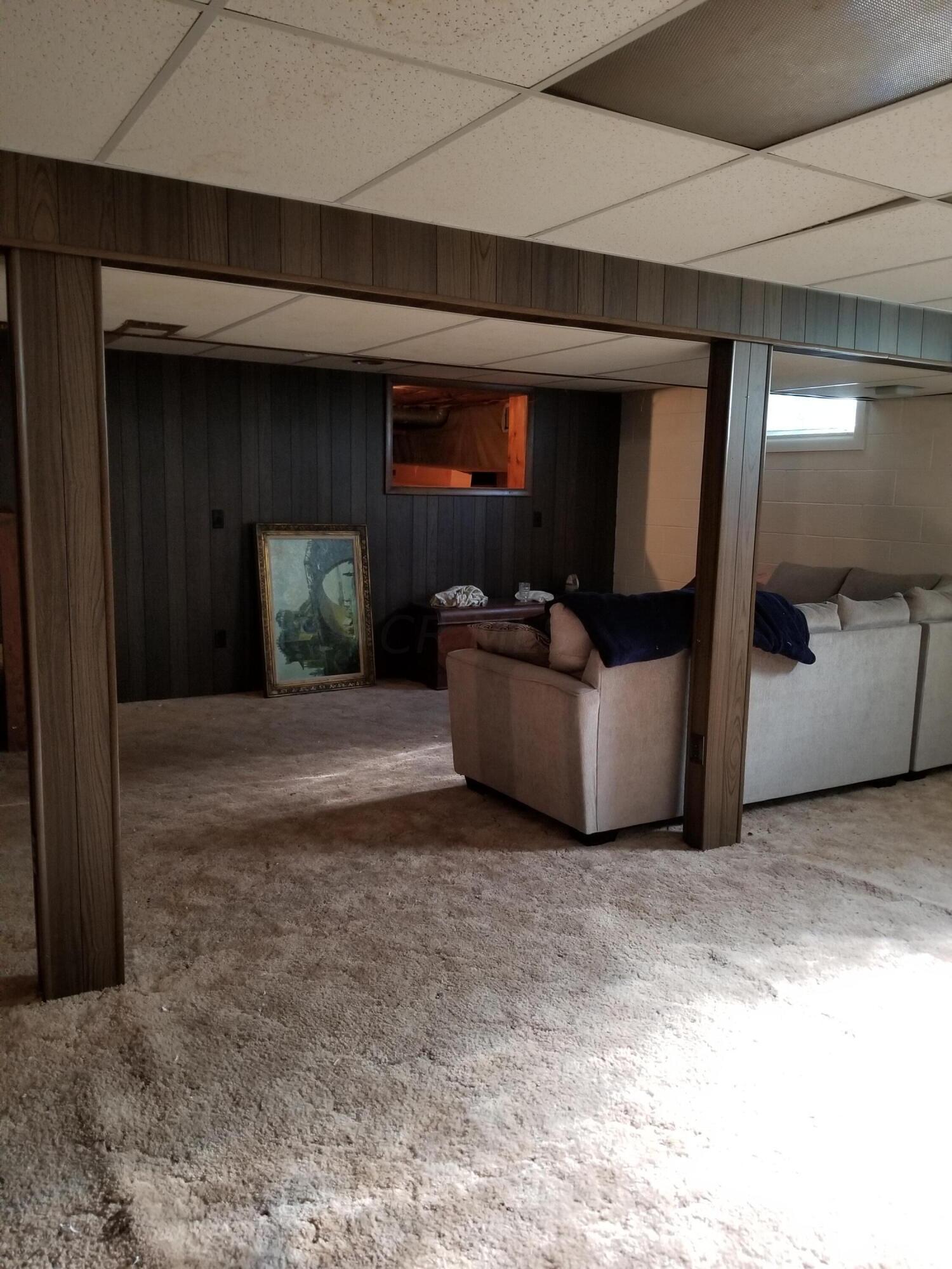 460 Jefferson Road Newark, OH 43055 - Photo 15 of 21 Large crawl space behind the picture in this room.
