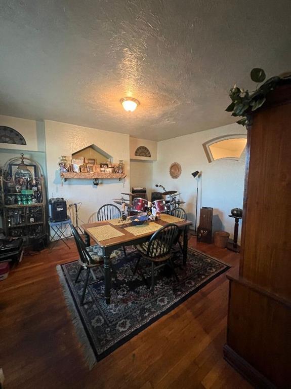1619 Brownsville Road Pittsburgh, PA 15210 - Photo 14 of 33 a living room with furniture and a wooden floor