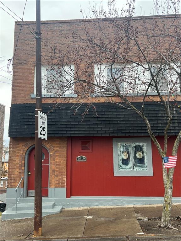 1619 Brownsville Road Pittsburgh, PA 15210 - Photo 2 of 33 a front view of a house