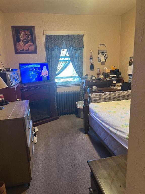 1619 Brownsville Road Pittsburgh, PA 15210 - Photo 21 of 33 a bed room with furniture and a window