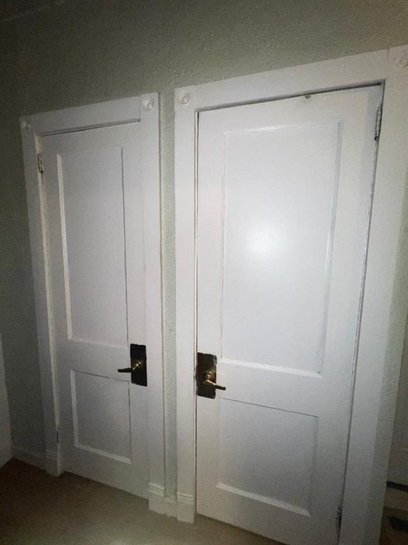 1619 Brownsville Road Pittsburgh, PA 15210 - Photo 23 of 33 a bathroom with a glass shower door