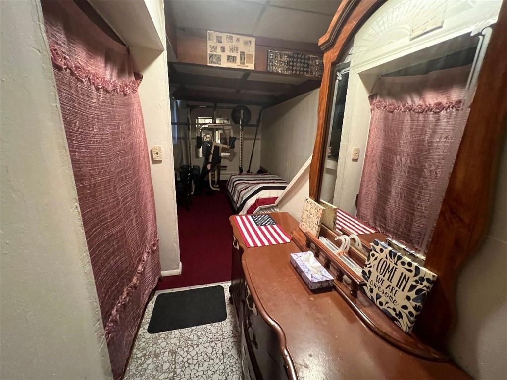 1619 Brownsville Road Pittsburgh, PA 15210 - Photo 30 of 33 a view of walk in closet with clothes