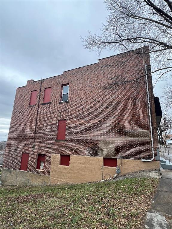 1619 Brownsville Road Pittsburgh, PA 15210 - Photo 33 of 33 a front view of a house with a yard