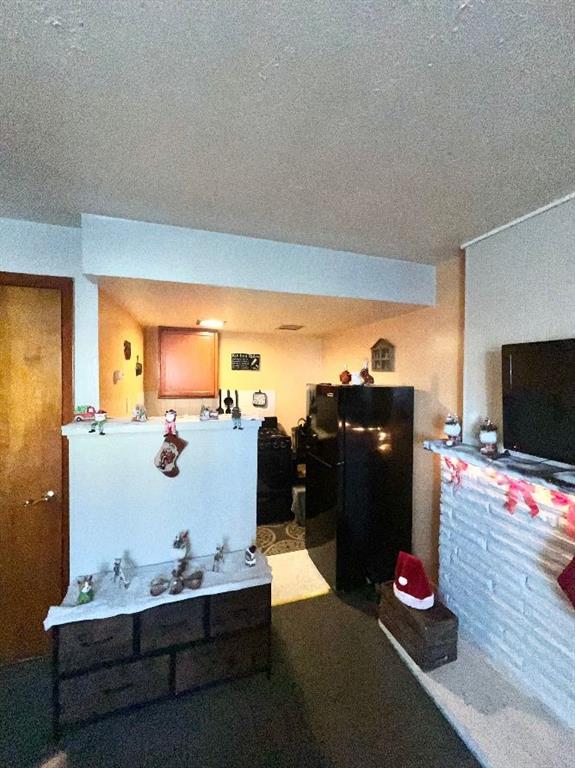 1619 Brownsville Road Pittsburgh, PA 15210 - Photo 9 of 33 a living room with furniture and a flat screen tv