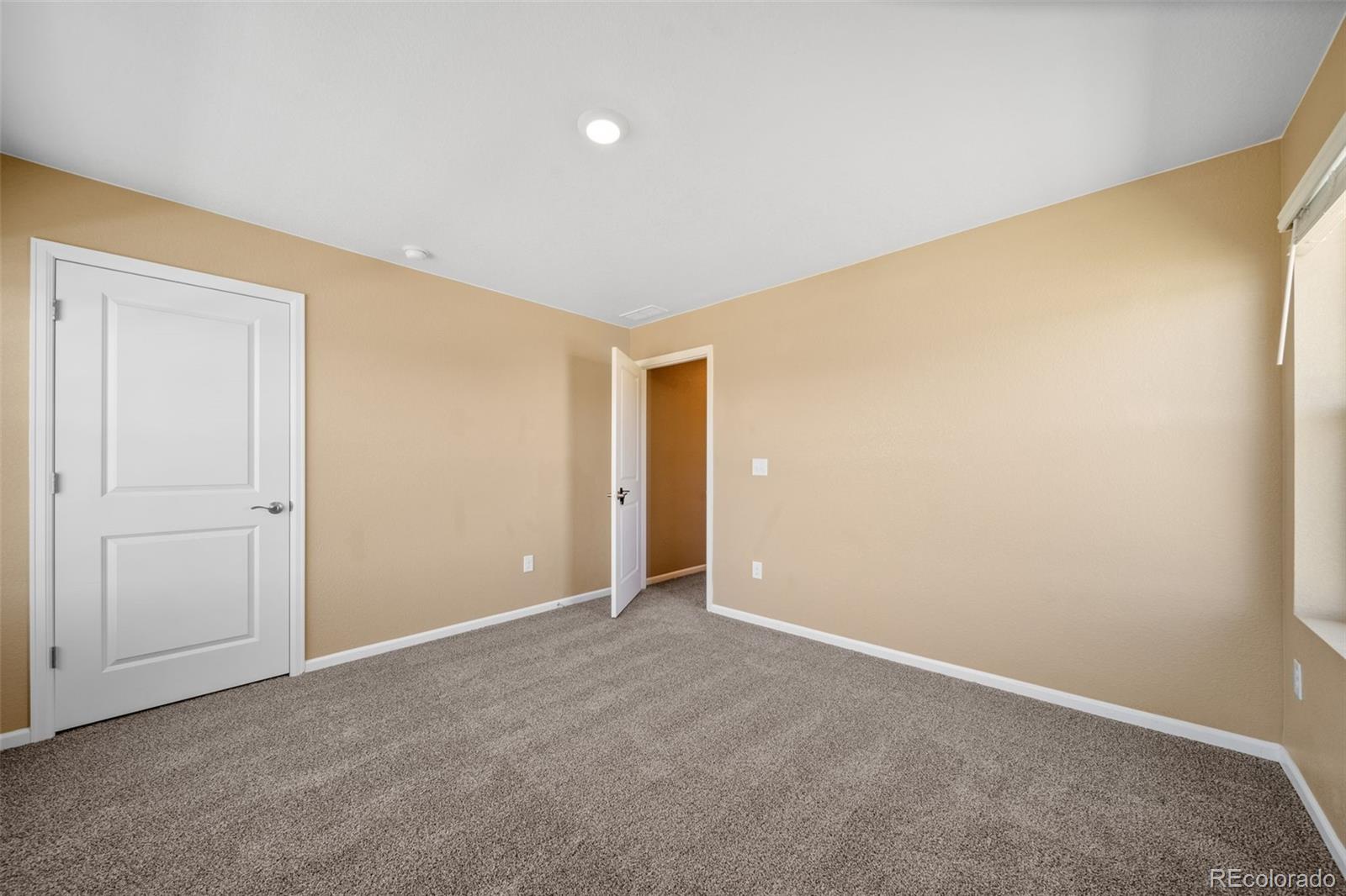 1 South Quantock Street Aurora, CO 80018 - Photo 27 of 43 a view of an empty room