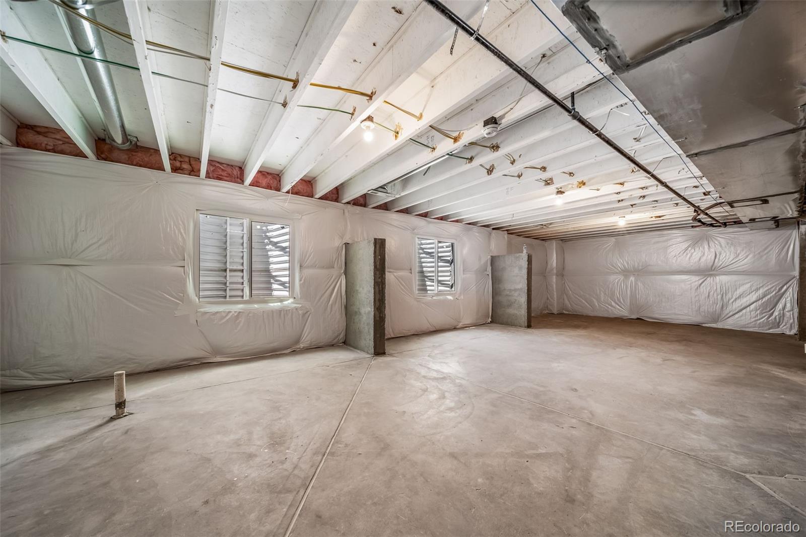 1 South Quantock Street Aurora, CO 80018 - Photo 30 of 43 a view of a garage