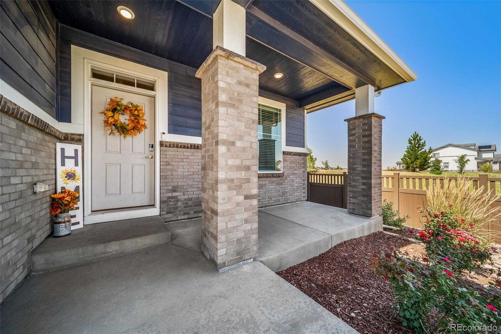 1 South Quantock Street Aurora, CO 80018 - Photo 4 of 43 a view of a entryway door outdoor space