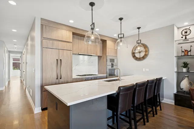a view of a dining area with furniture and wooden floor