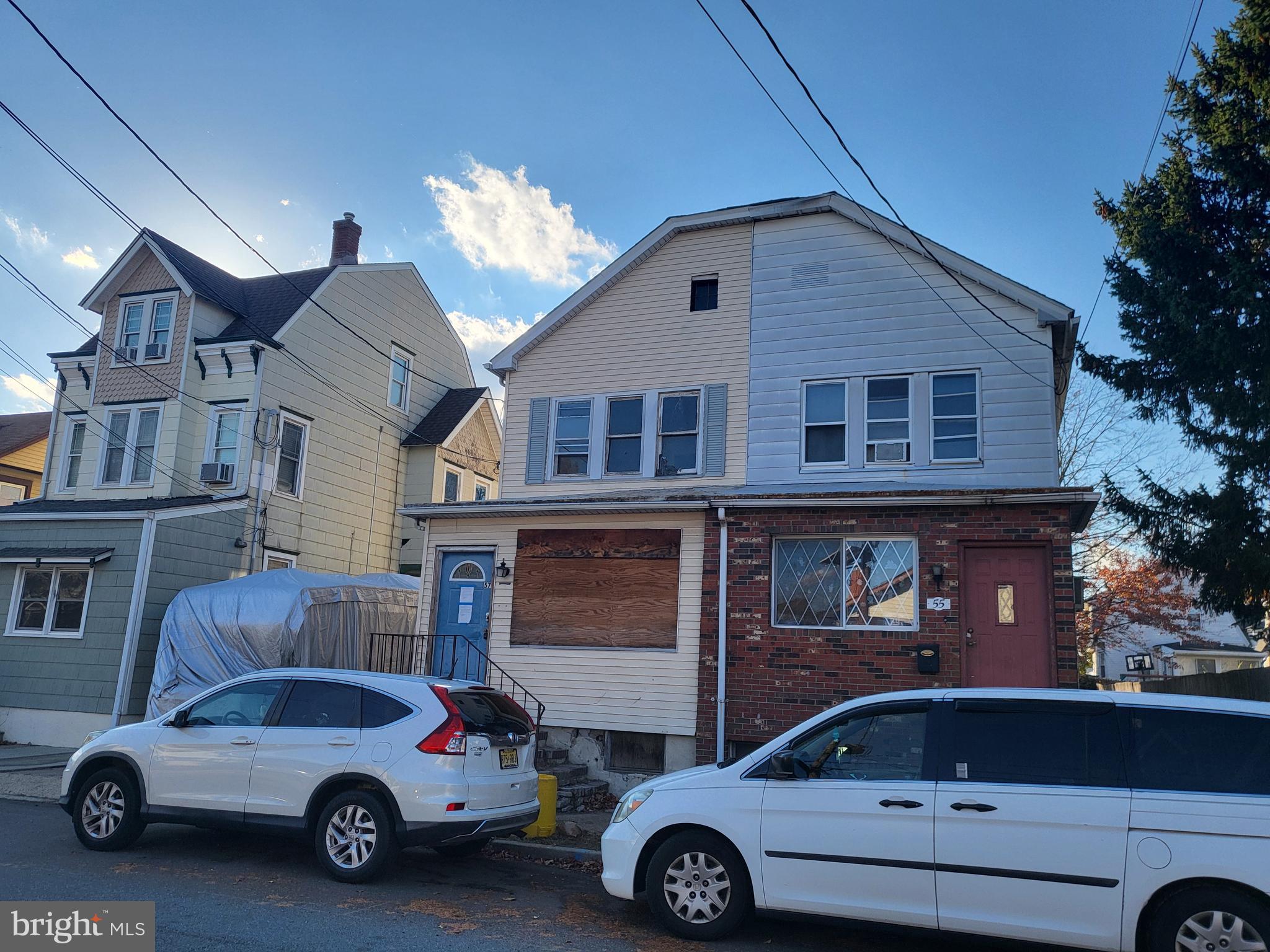 a car parked in front of a house
