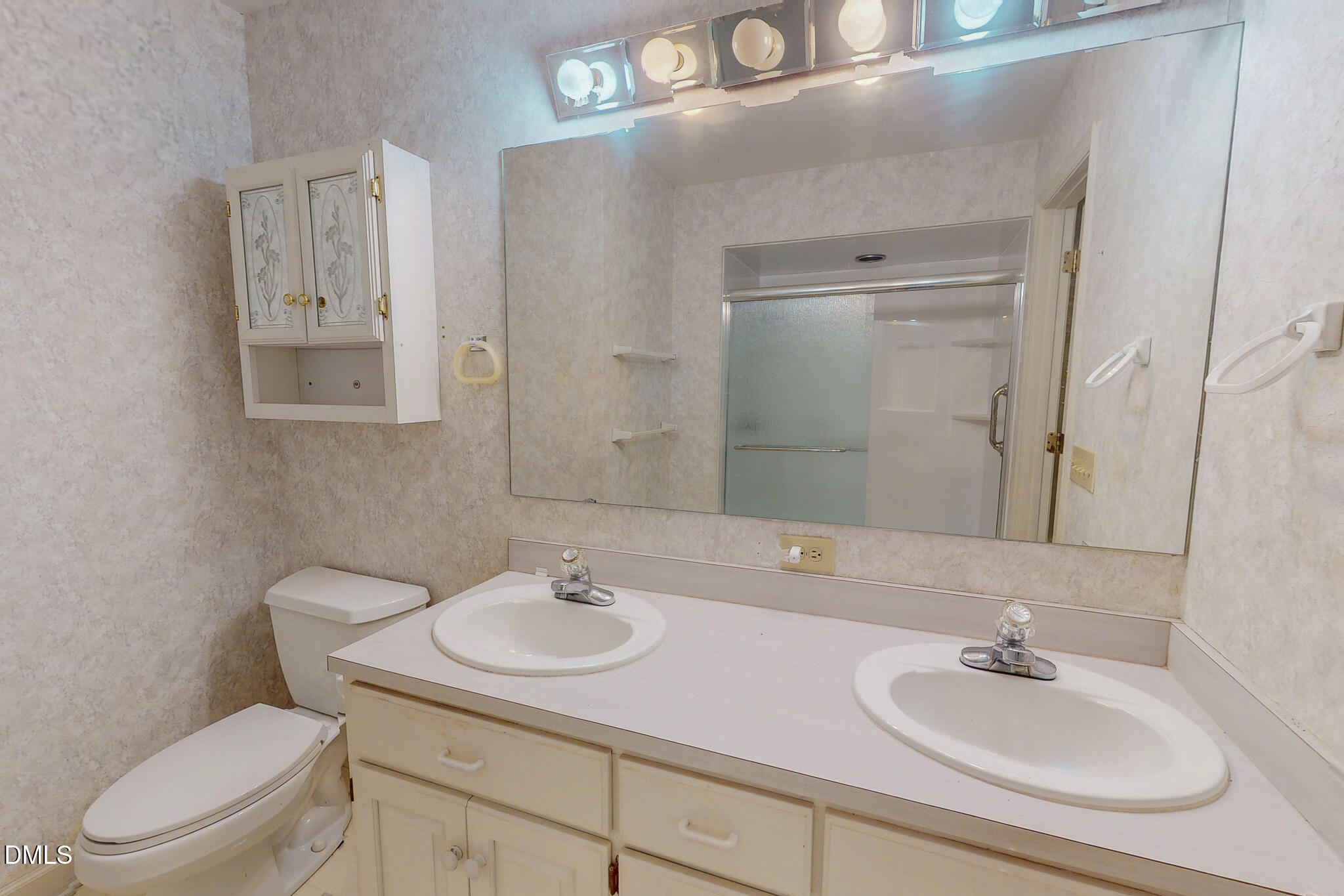11 Denada Path Roxboro, NC 27574 - Photo 31 of 62 a bathroom with a sink toilet and a mirror