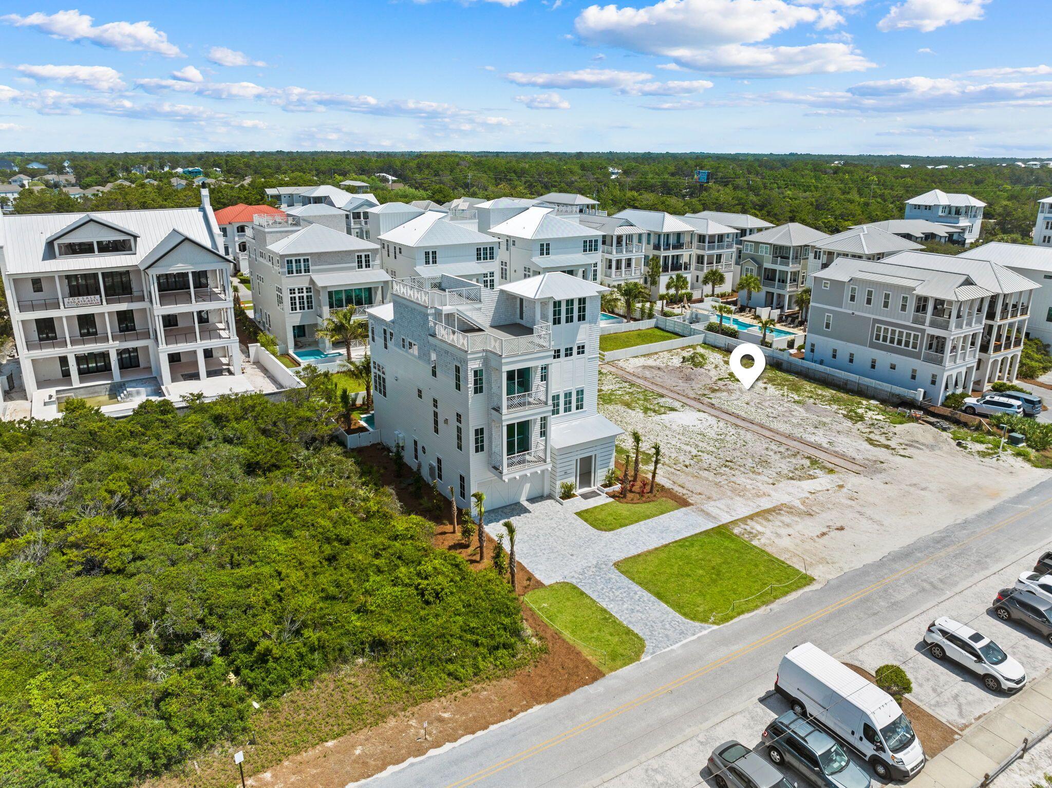 346 West Park Place Ave Inlet Beach Inlet Beach, FL 32461 - Photo 1 of 9 a view of a city with tall buildings