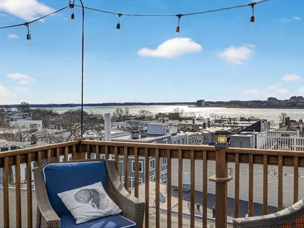 a view of a balcony with city view