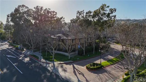 a view of a chairs and table on the wooden floor