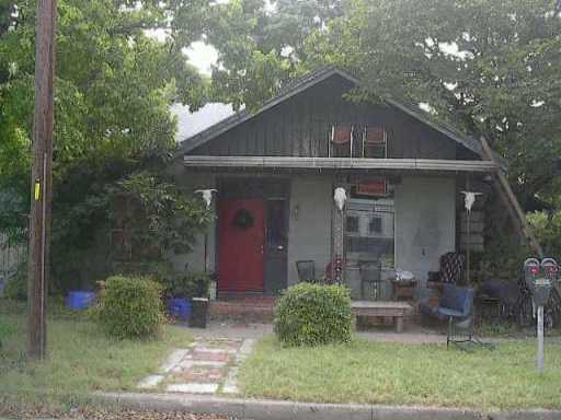1801 Nueces Street Austin, TX 78701 - Photo 1 of 1 a front view of a house with garden