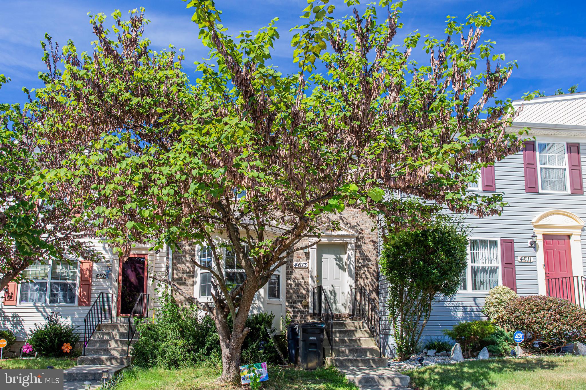 a front view of a multi story residential apartment buildings