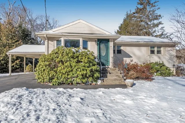 front view of a house with a yard