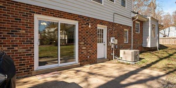 517 Wallingham Drive Midlothian, VA 23114 - Photo 6 of 11 a backyard of a house with seating space