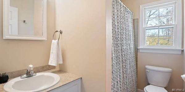 517 Wallingham Drive Midlothian, VA 23114 - Photo 8 of 11 a bathroom with a sink toilet and shower