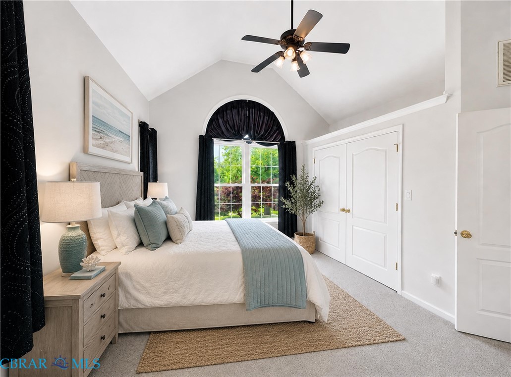 1214 Dandy Loop Road Yorktown, VA 23692 - Photo 30 of 65 a bedroom with a large bed and a large window