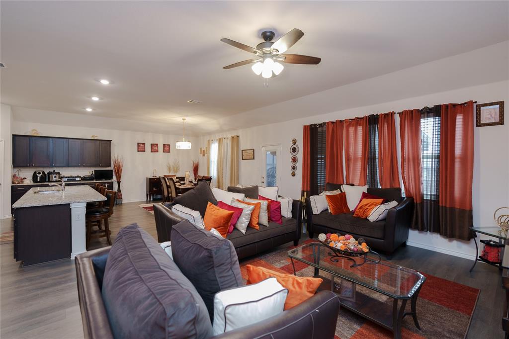 4009 Forest Bend Road Denton, TX 76208 - Photo 12 of 35 Living room featuring dark wood-type flooring, a ceiling fan, and recessed lighting