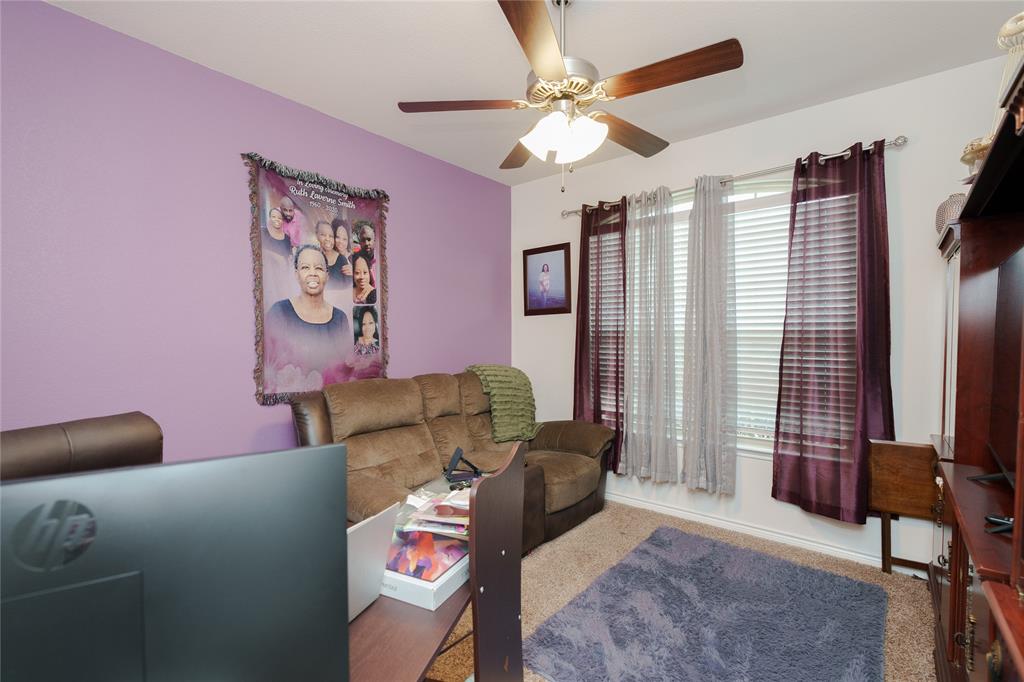 4009 Forest Bend Road Denton, TX 76208 - Photo 21 of 35 Living area featuring ceiling fan and carpet floors