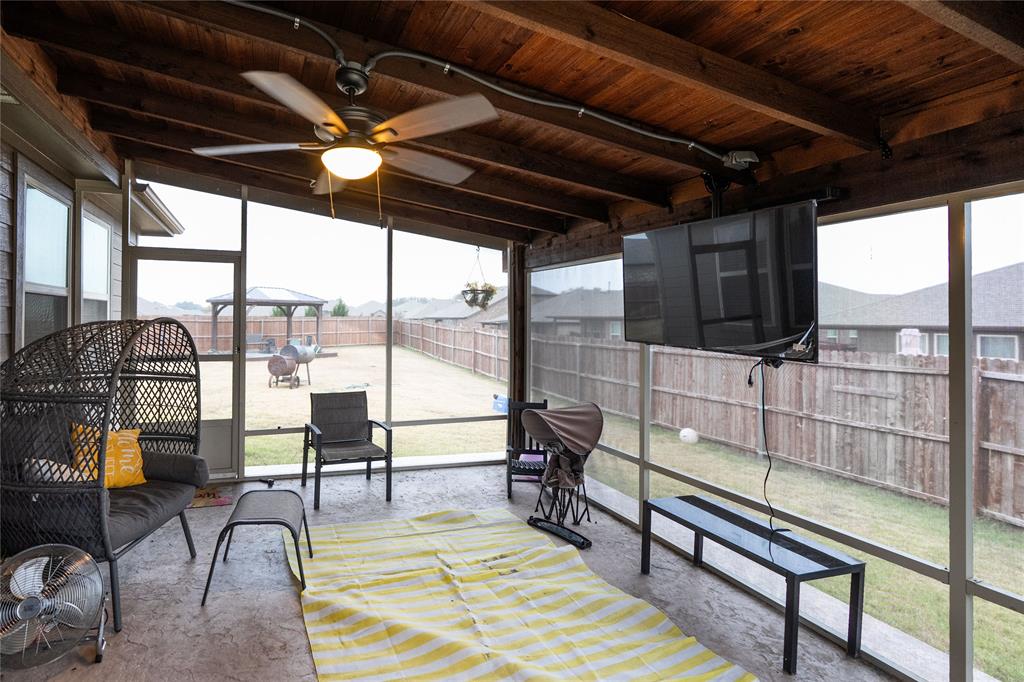 4009 Forest Bend Road Denton, TX 76208 - Photo 29 of 35 Sunroom featuring beam ceiling