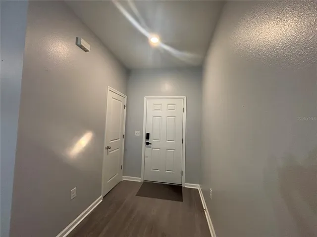 a view of a kitchen with a dishwasher and cabinets