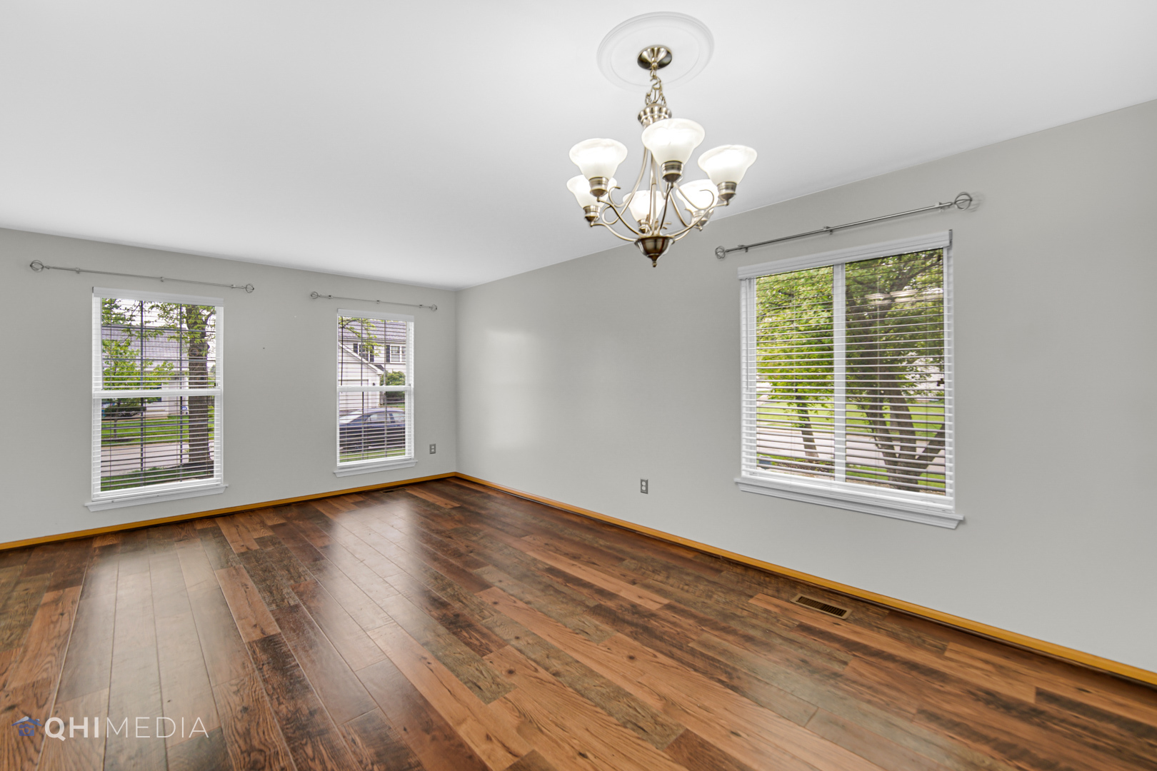 21432 Georgetown Drive Plainfield, IL 60544 - Photo 12 of 24 a view of an empty room with wooden floor and a window