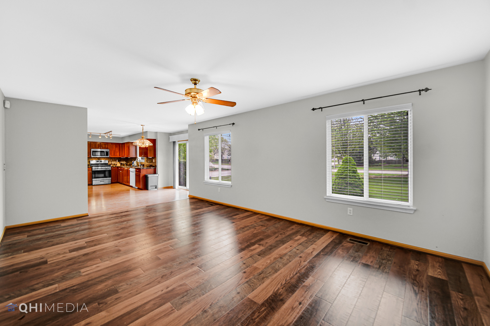 21432 Georgetown Drive Plainfield, IL 60544 - Photo 13 of 24 wooden floor in an empty room with a window