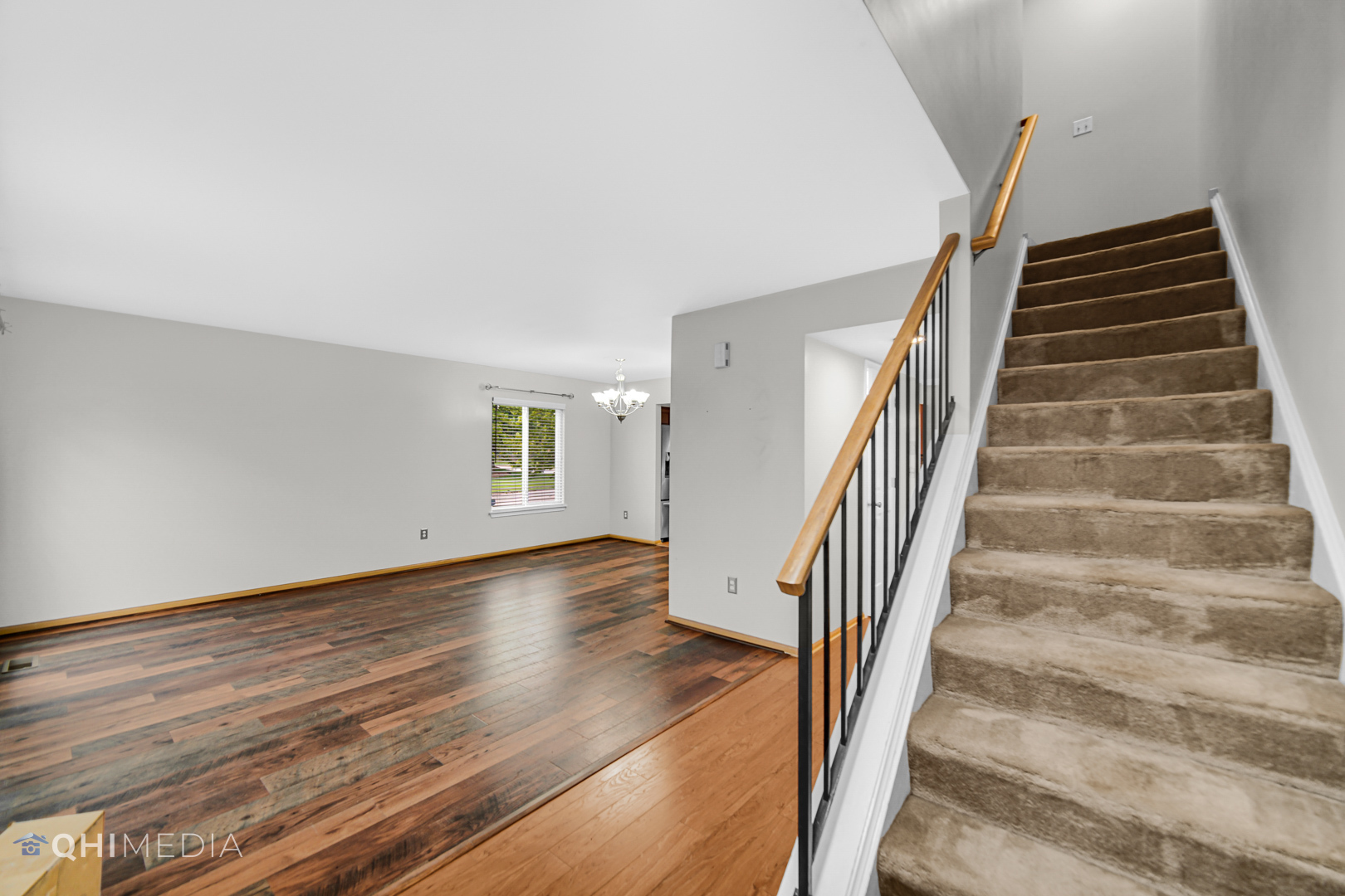 21432 Georgetown Drive Plainfield, IL 60544 - Photo 14 of 24 wooden floor in an empty room with stairs