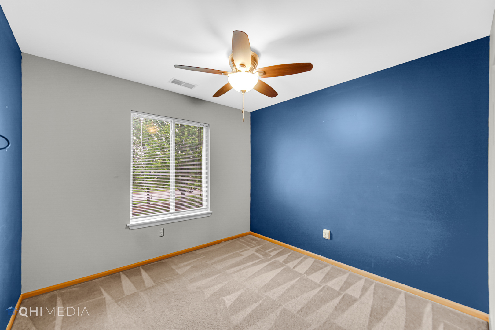 21432 Georgetown Drive Plainfield, IL 60544 - Photo 16 of 24 an empty room with windows and fan