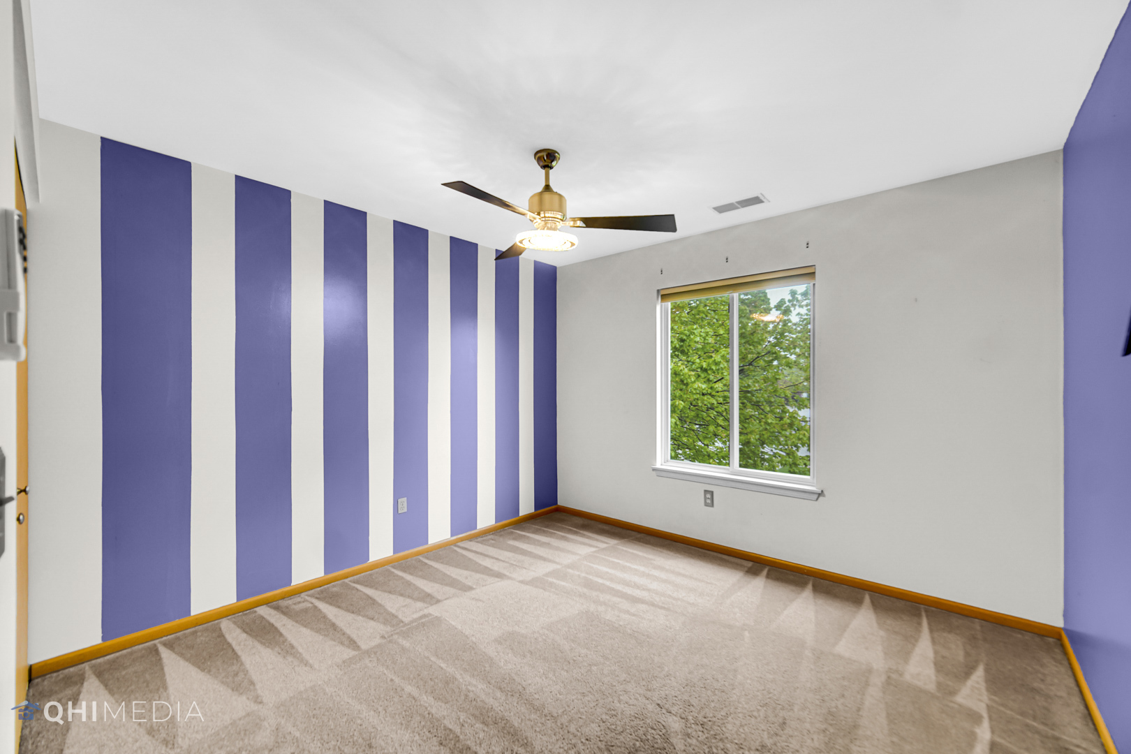 21432 Georgetown Drive Plainfield, IL 60544 - Photo 17 of 24 a view of a livingroom with a ceiling fan and window