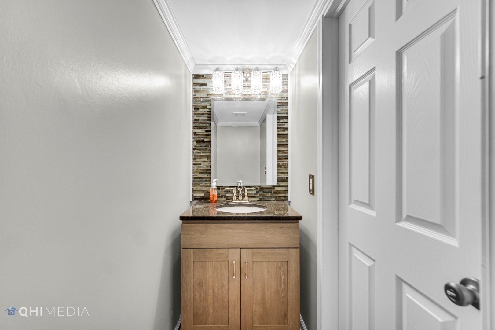 21432 Georgetown Drive Plainfield, IL 60544 - Photo 19 of 24 a bathroom with a sink and a mirror