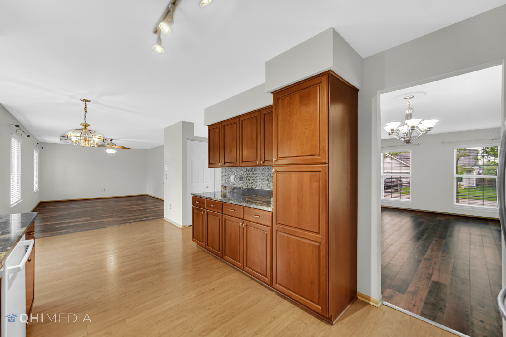 21432 Georgetown Drive Plainfield, IL 60544 - Photo 5 of 24 a kitchen with stainless steel appliances granite countertop a refrigerator and a sink